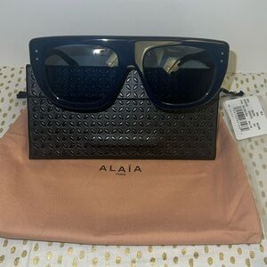 Alaïa
55mm Shield Sunglasses